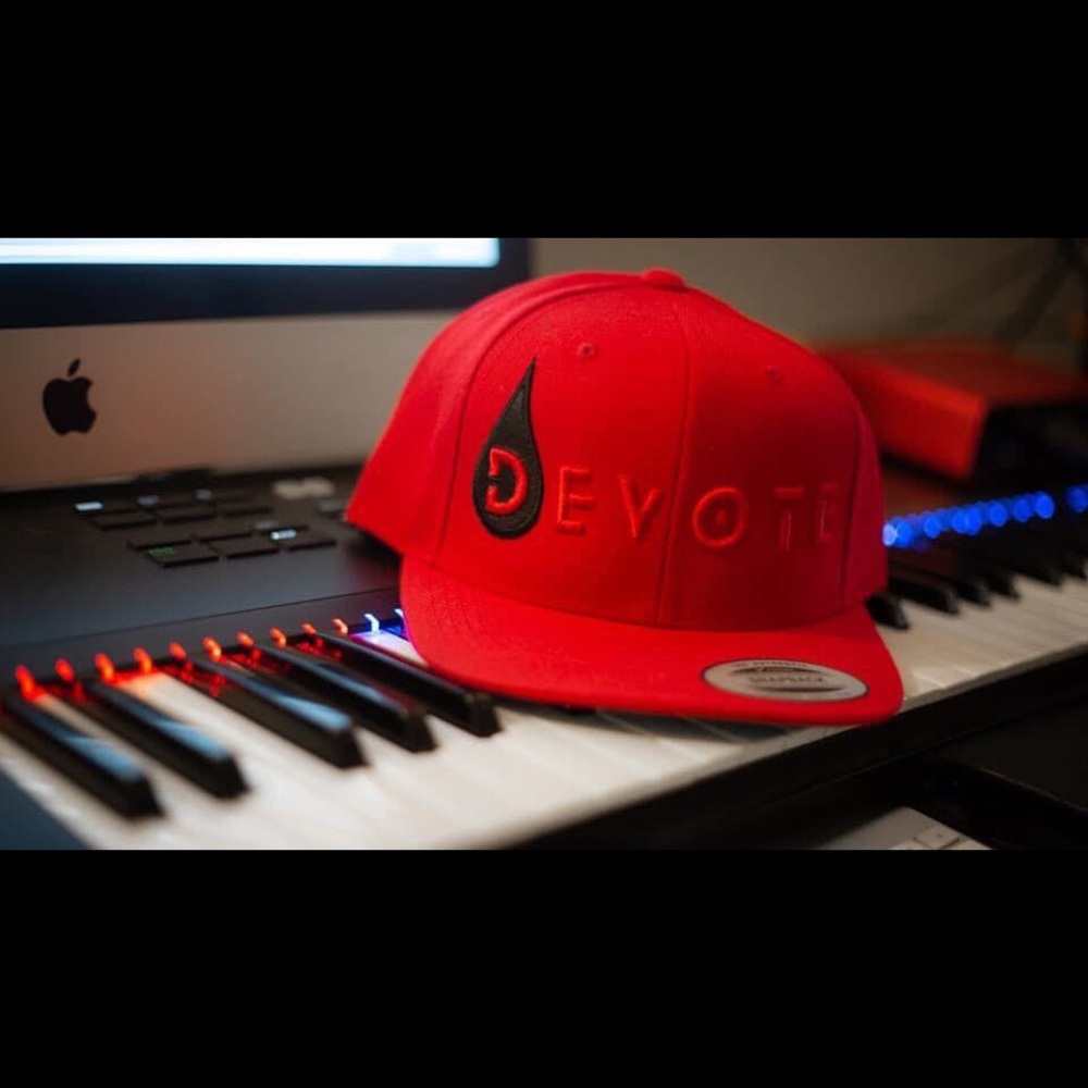 DEVOTE brand hat. Red